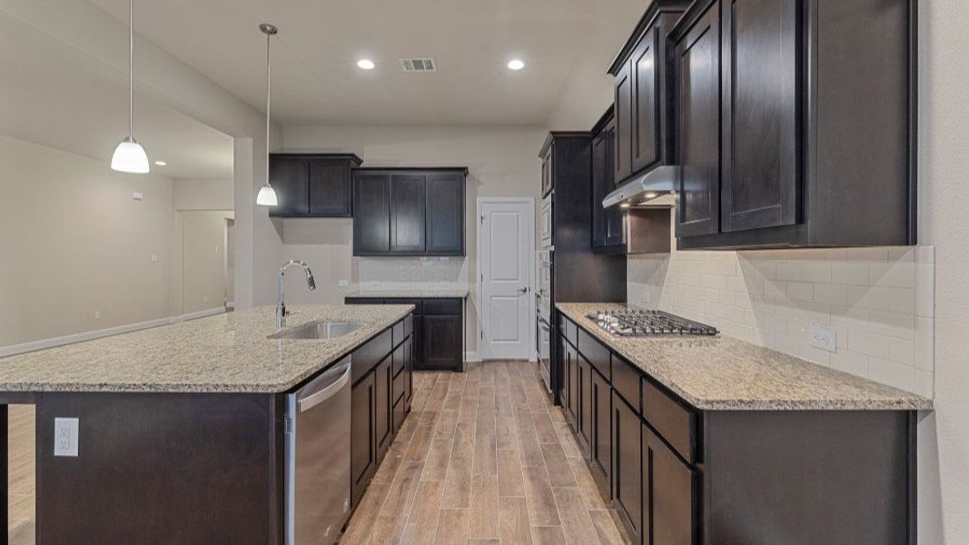 Furnished interior in a model home at Eden Ranch in Arlington (Image 25).