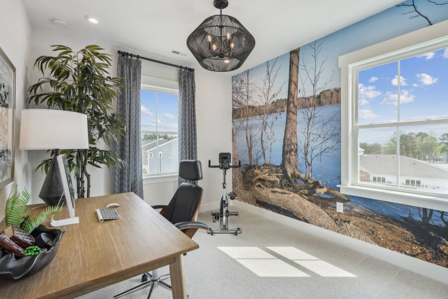 Furnished interior in a model home at Mews at Holding Village in Wake Forest (Image 43).