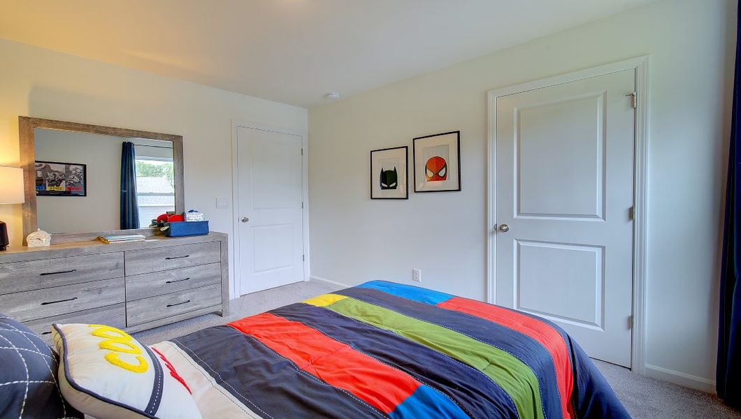 Furnished interior in a model home at Heritage Park in Fletcher (Image 35).