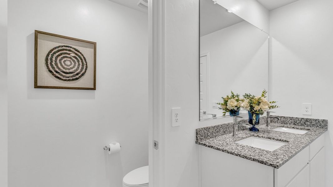 Furnished interior in a model home at Blackhawk in Tucson (Image 40).