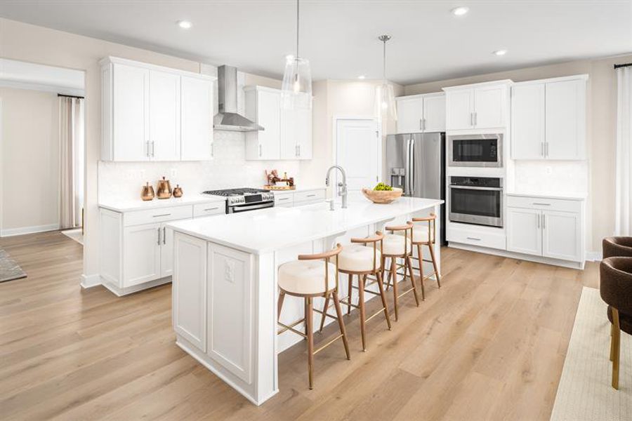 Style meets function in luxury kitchens with large islands & stainless steel appliances