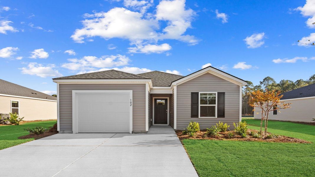 Front exterior of a home in the Palm Ridge community, located in Guyton, GA (Image 12).