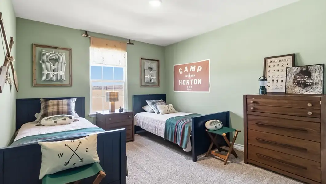 Furnished interior in a model home at The Woodlands at Medina Hills in Mico (Image 19).