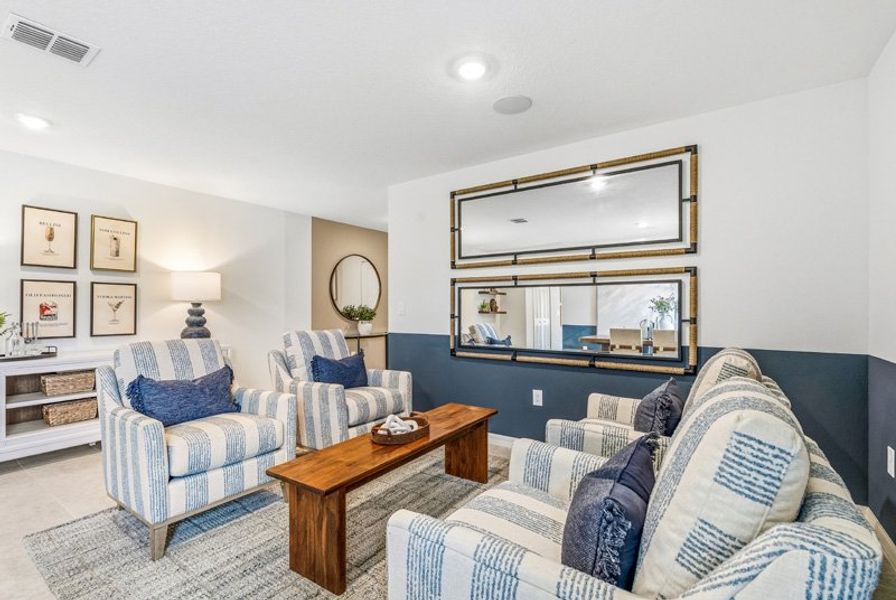 Furnished interior in a model home at Tillman Oaks in Wildwood (Image 28).