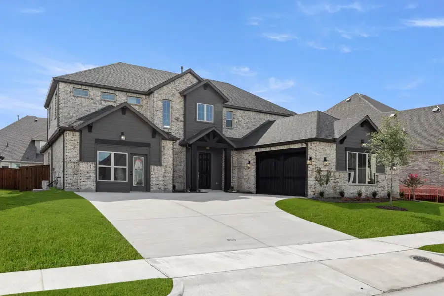 Front exterior of a home in the Gideon Grove community, located in Rockwall, TX (Image 2). Front exterior of a home in the Gideon Grove community, located in Rockwall, TX (Image 2).