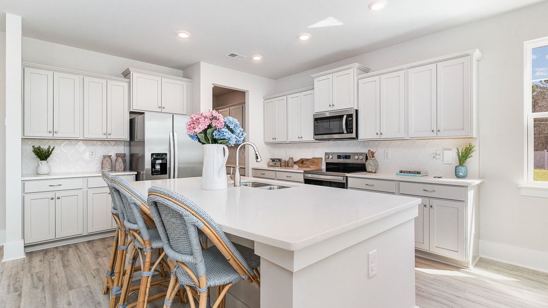 Furnished interior in a model home at Heron Pointe in Myrtle Beach (Image 5).