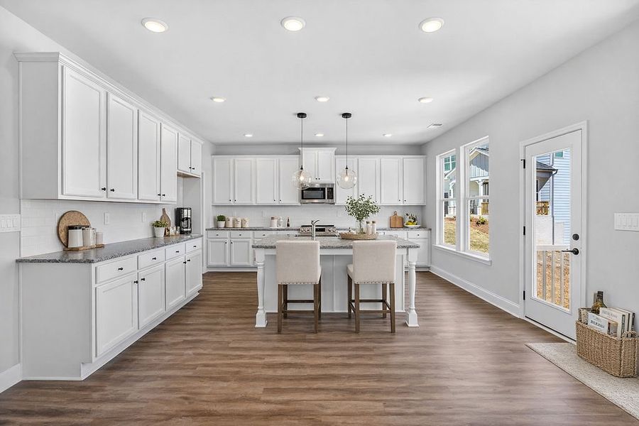 Furnished interior in a model home at Chimney Oaks Overlook in Homer (Image 7).