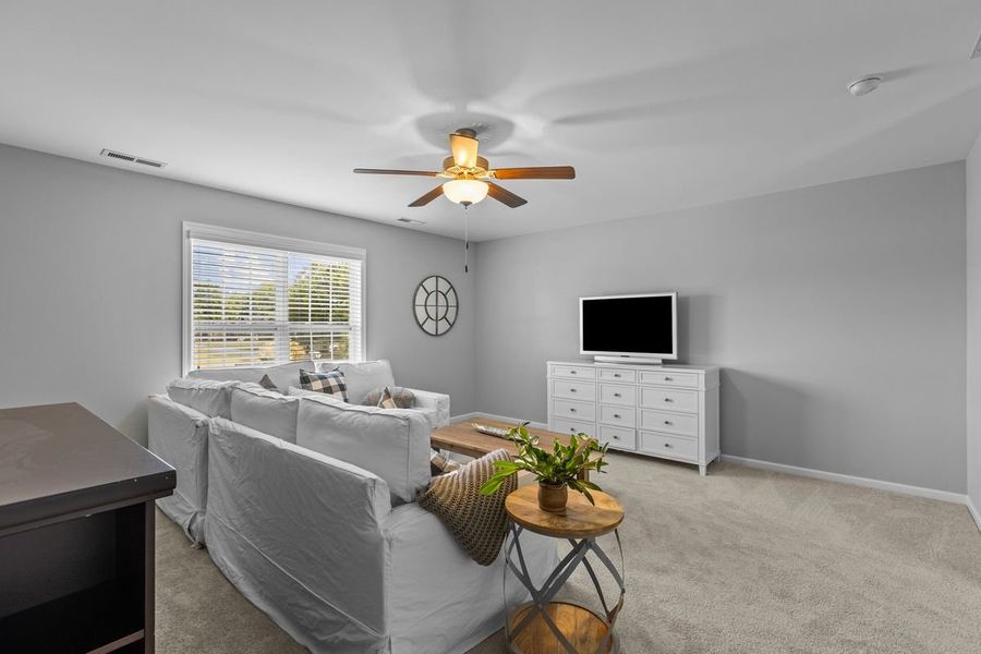 Furnished interior in a model home at The Preserve at Langston in Winterville (Image 10).