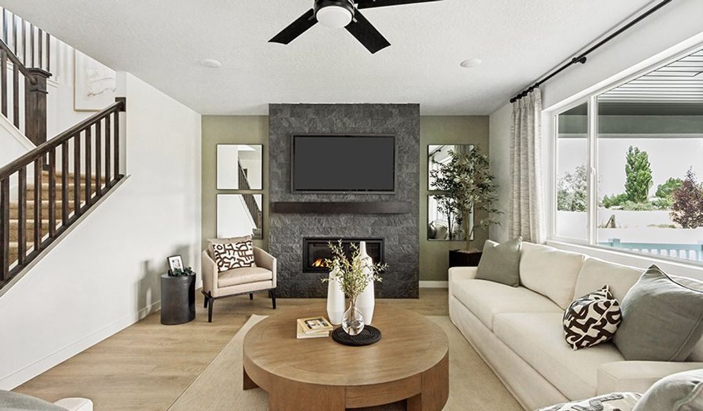 Furnished interior in a model home at Peaceful Ridge in Colorado Springs (Image 6).
