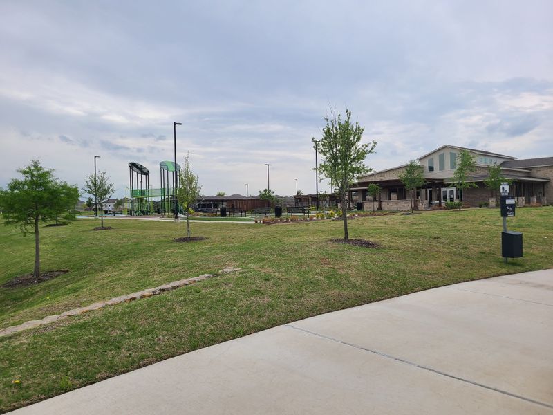 A scenic community park with a modern playground in Eastridge by Trophy Signature Homes (McKinney, TX). A scenic community park with a modern playground in Eastridge by Trophy Signature Homes (McKinney, TX).