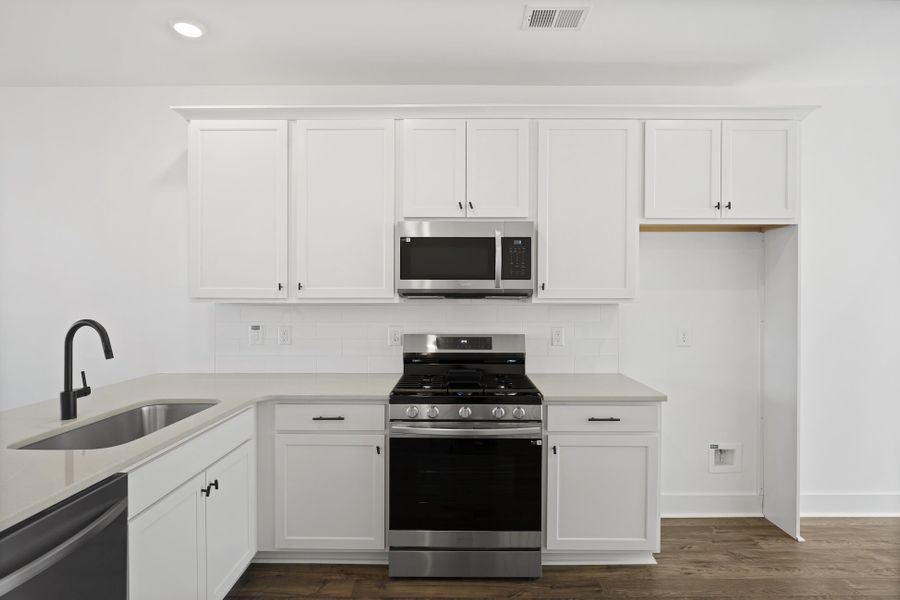 Furnished interior in a model home at Renaissance Place in Greenville (Image 5).