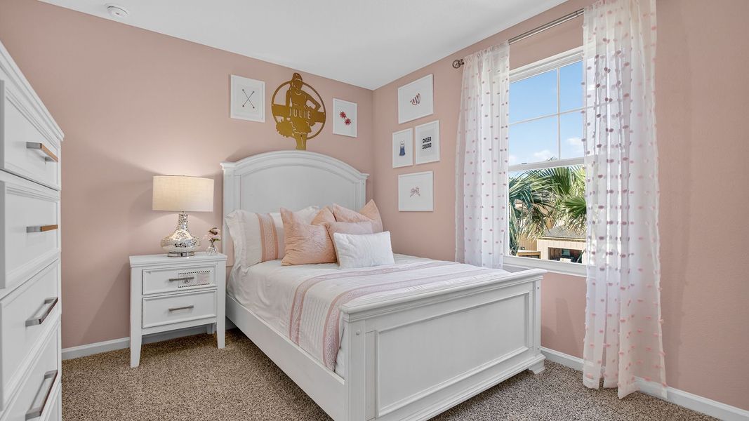 Furnished interior in a model home at Liberty Cove in Yulee (Image 11).