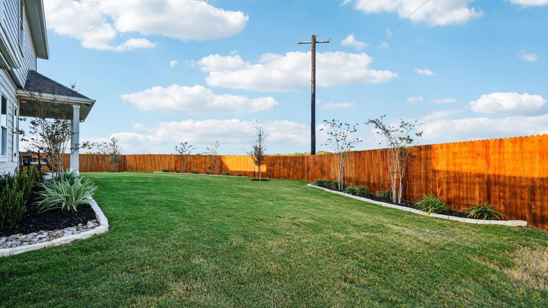 Large Backyard complete with outdoor covered patio