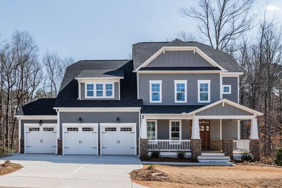 Front exterior of a home in the Brighton Forest - Apex - Robuck Homes community, located in Garner, NC (Image 11).
