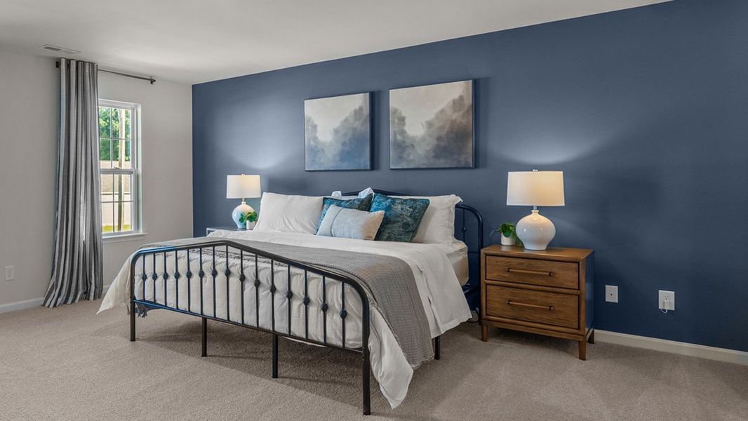 Furnished interior in a model home at Bedford Place in Wilson (Image 4).