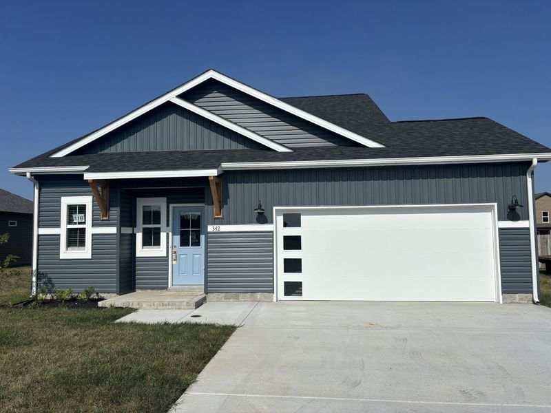 Front exterior of a home in the Cherry Fields community, located in Clarksville, TN (Image 1).