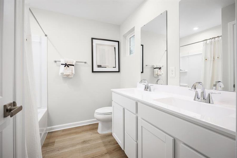 PRIVATE BATH WITH DUAL VANITIES, ROOMY SHOWER, AND LARGE WALK-IN CLOSET PRIVATE BATH WITH DUAL VANITIES, ROOMY SHOWER, AND LARGE WALK-IN CLOSET