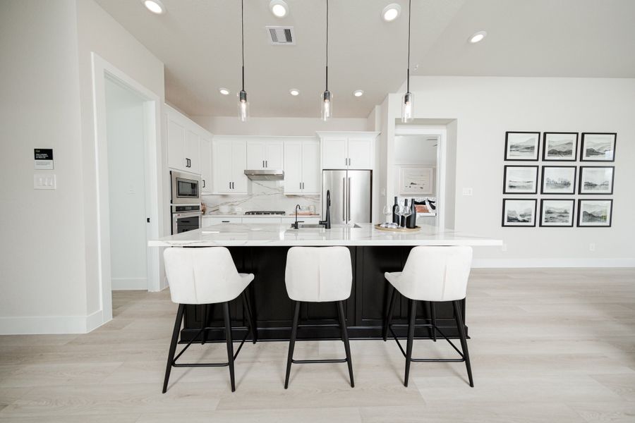 Furnished interior in a model home at The Highlands in Porter (Image 15).