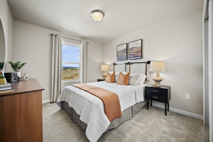 Furnished interior in a model home at Aspen Meadows – Townhomes in Colorado Springs (Image 17). Furnished interior in a model home at Aspen Meadows – Townhomes in Colorado Springs (Image 17).