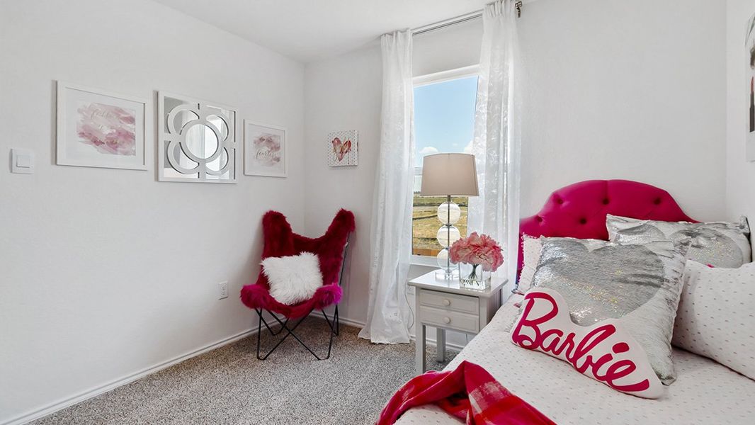 Furnished interior in a model home at Sereno Springs in Converse (Image 29).