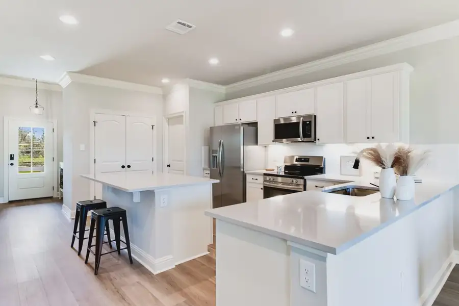 Furnished interior in a model home at Aldeana in Bonney (Image 3).