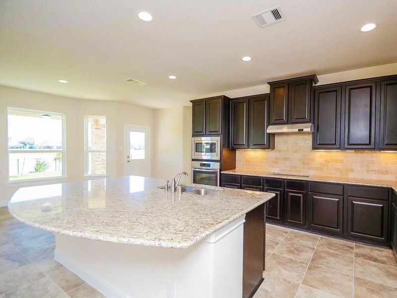 A showcase of a new construction home by Anglia Homes, highlighting their design and quality (Image 13).