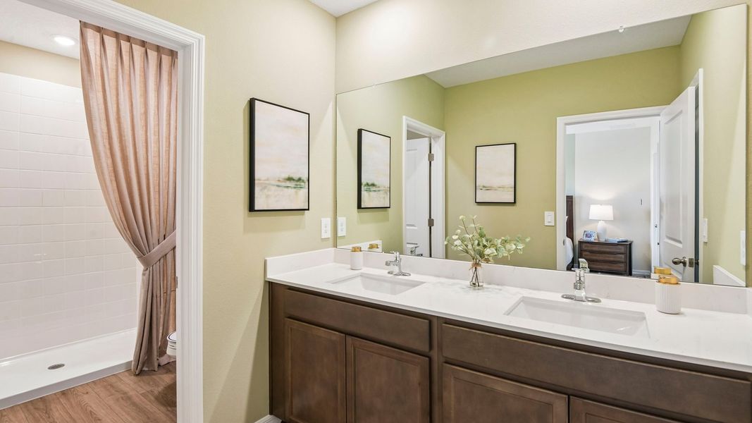 Furnished interior in a model home at Sanctuary at Citrus Park Townhomes in Tampa (Image 22).