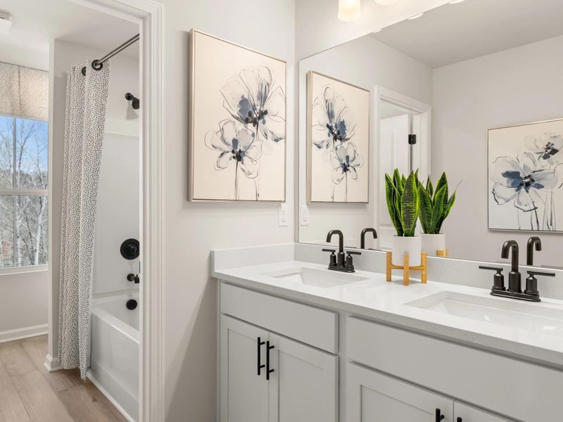 Furnished interior in a model home at The Bluffs in Canton (Image 12).