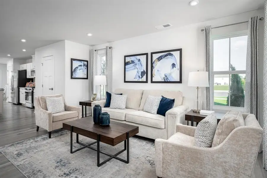 Furnished interior in a model home at Middle Creek Village Coastal Cottages & Villas in Bolivia (Image 6).