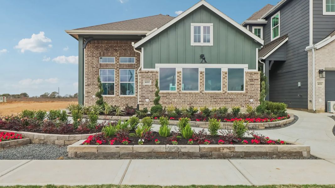 Front exterior of a home in the Jubilee Chateau community, located in Hockley, TX (Image 3).