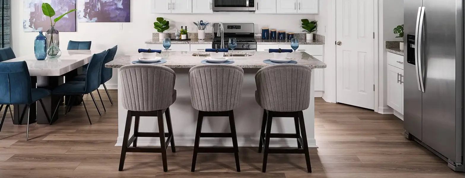 Kitchen in Hibiscus floorplan modeled at The Reserve at Twin Lakes