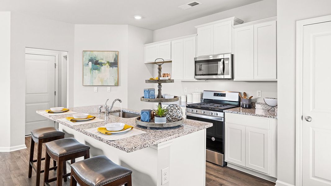 Furnished interior in a model home at The Parish at Flat Rock Townhomes in Graniteville (Image 3).