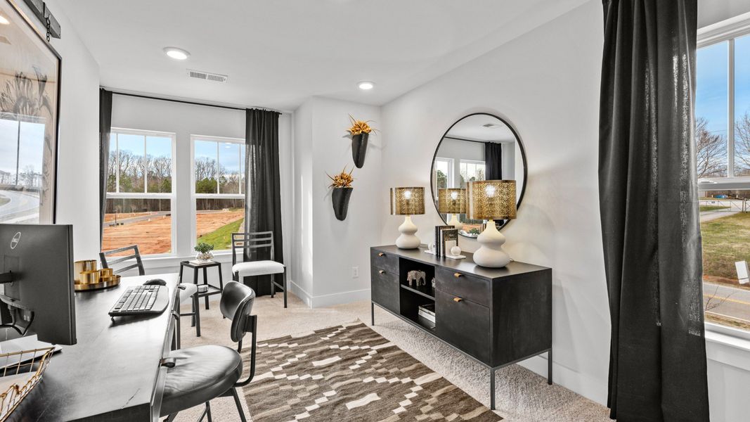 Furnished interior in a model home at Marion Square in Greenville (Image 1). Furnished interior in a model home at Marion Square in Greenville (Image 1).