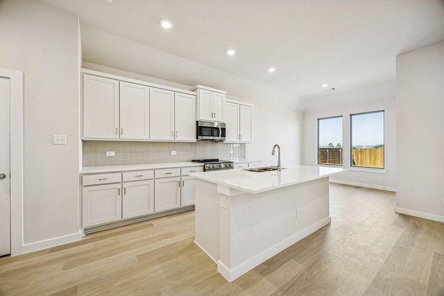 Furnished interior in a model home at Freeman Farm in Kaufman (Image 36).