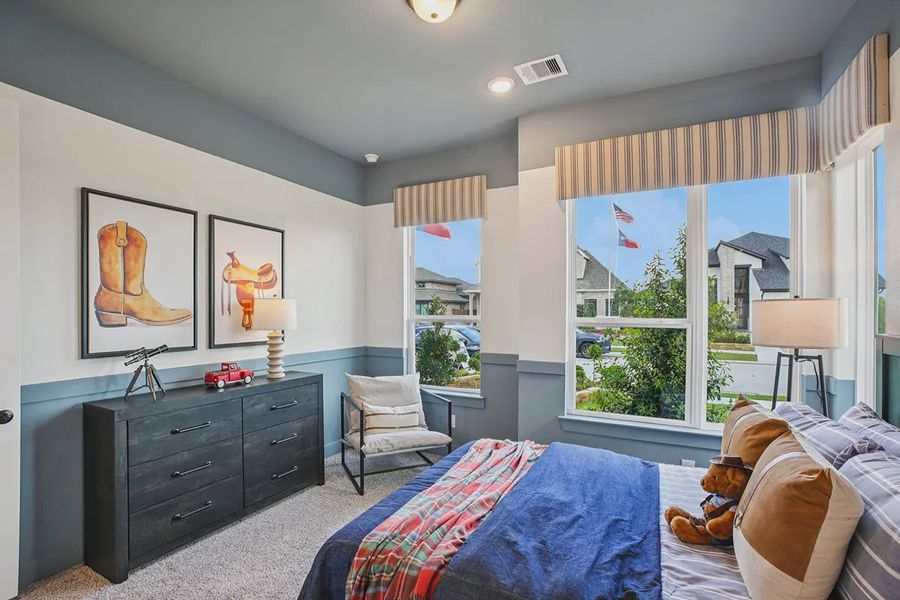 Furnished interior in a model home at Meridiana 50's in Manvel (Image 8).