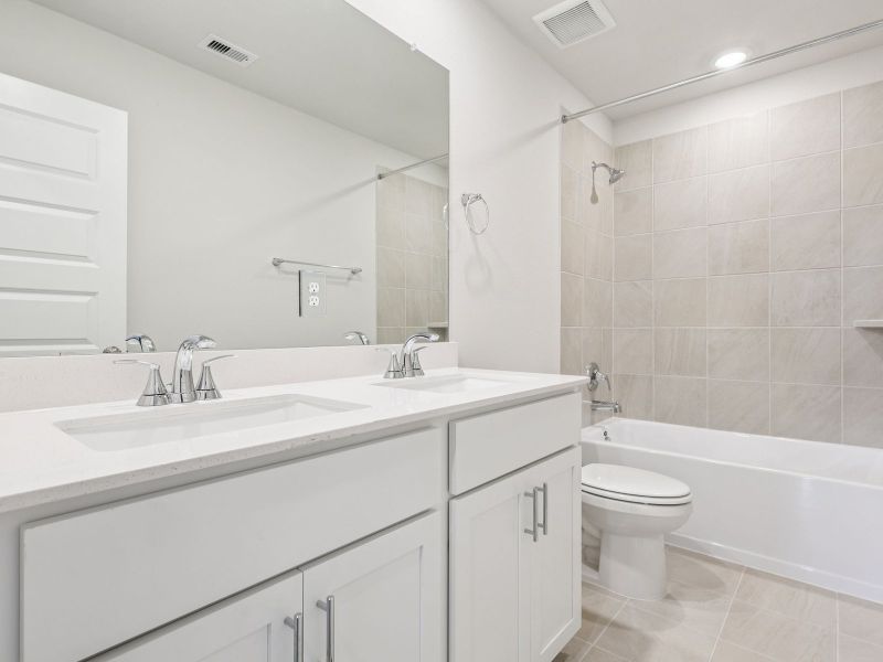 Furnished interior in a model home at Spring Brook Village - Luxe Series in Houston (Image 13). Furnished interior in a model home at Spring Brook Village - Luxe Series in Houston (Image 13).