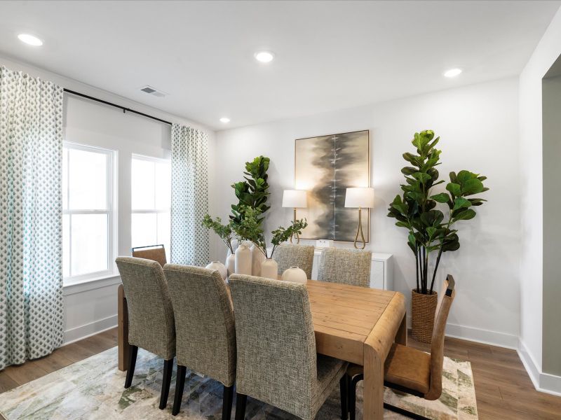Furnished interior in a model home at The Coves at Lakes of Cane Bay in Summerville (Image 8). Furnished interior in a model home at The Coves at Lakes of Cane Bay in Summerville (Image 8).