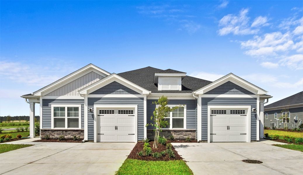 Front exterior of a home in the The Paired Villas at Bridgewater community, located in Little River, SC (Image 3).