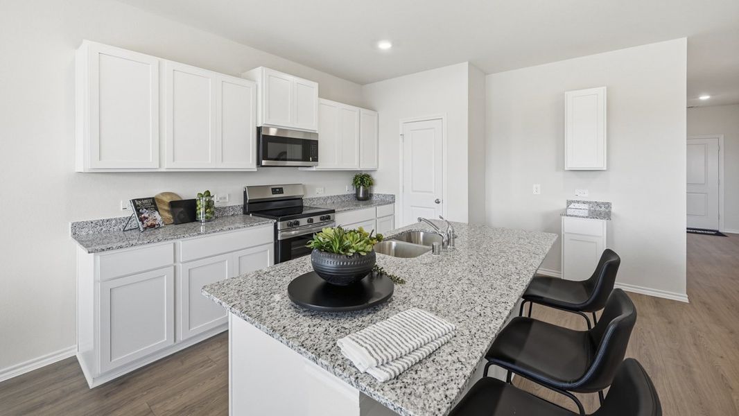 Furnished interior in a model home at Sanger Circle in Sanger (Image 49).
