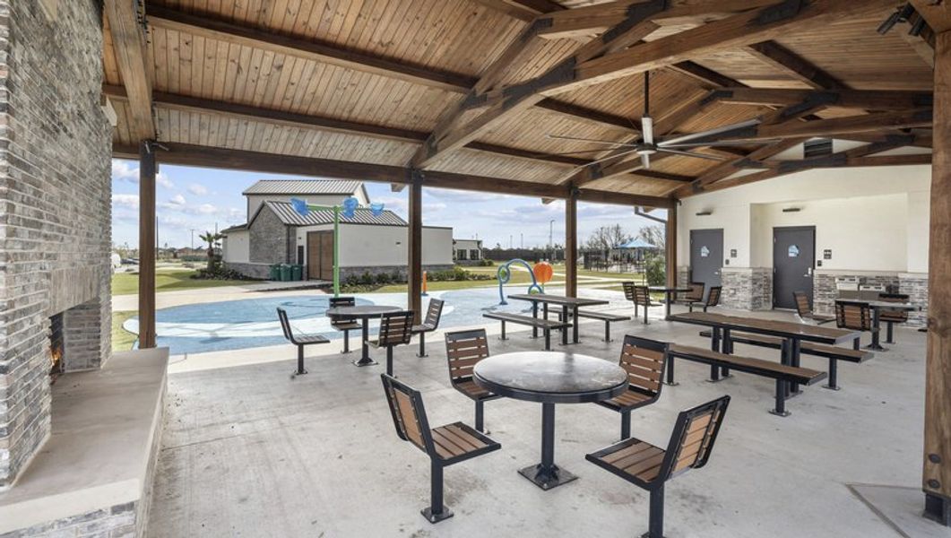 Enjoy a meal outdoors on the covered dining area. Enjoy a meal outdoors on the covered dining area.