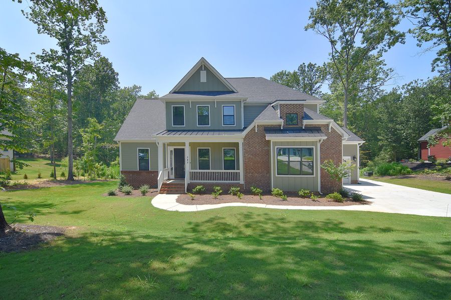 Front exterior of a home in the Deer Brook community, located in Mooresville, NC (Image 4). Front exterior of a home in the Deer Brook community, located in Mooresville, NC (Image 4).