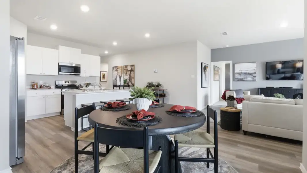 Furnished interior in a model home at Hadley Farms in Godley (Image 5).