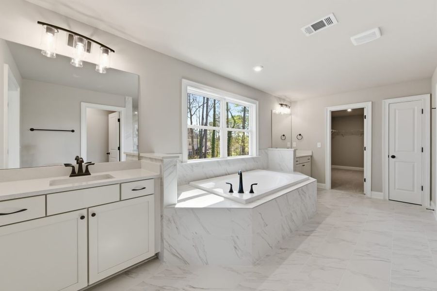 Furnished interior in a model home at Ford Landing in Acworth (Image 21).