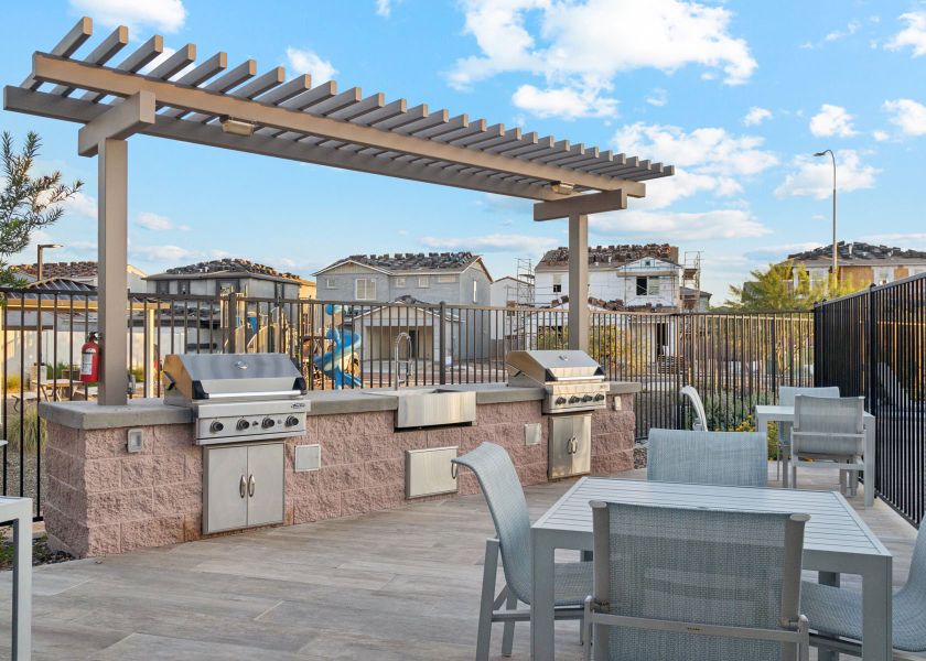 A patio with tables and chairs. A patio with tables and chairs.
