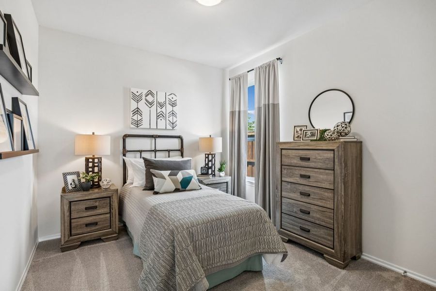 Furnished interior in a model home at Heartland in Crandall (Image 31).