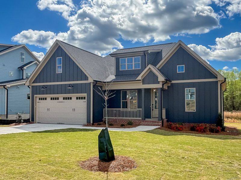 Front exterior of a home in the Forest Bluff Estates community, located in Fuquay Varina, NC (Image 13). Front exterior of a home in the Forest Bluff Estates community, located in Fuquay Varina, NC (Image 13).