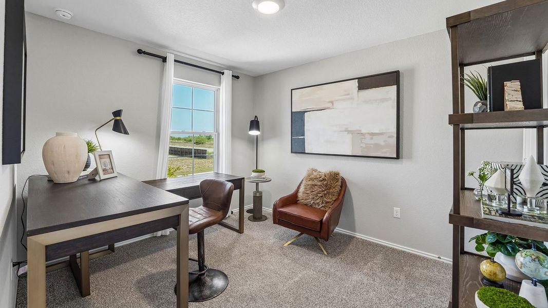 Furnished interior in a model home at Palomino in Manor (Image 32).