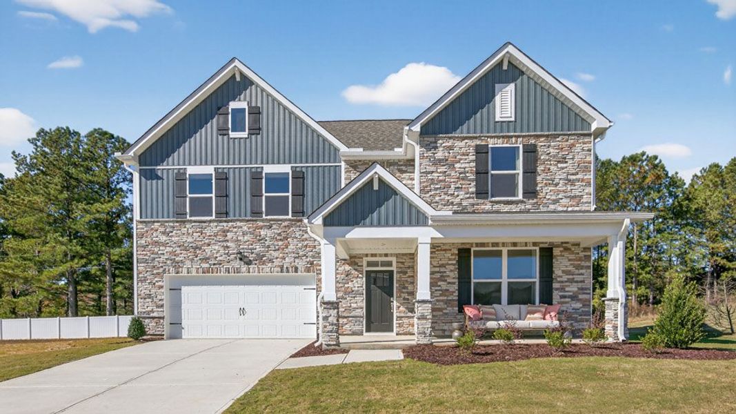 Front exterior of a home in the The Manors at Swift Creek Farm community, located in Clayton, NC (Image 2).