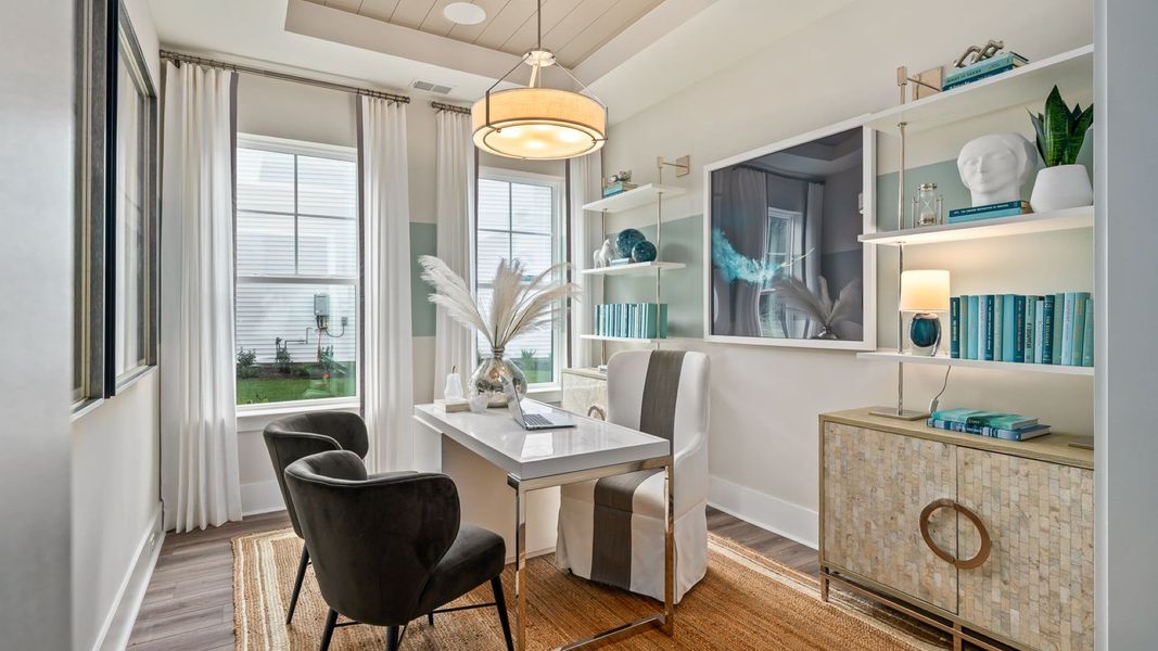 Furnished interior in a model home at Ocean Isle Palms in Shallotte (Image 13).
