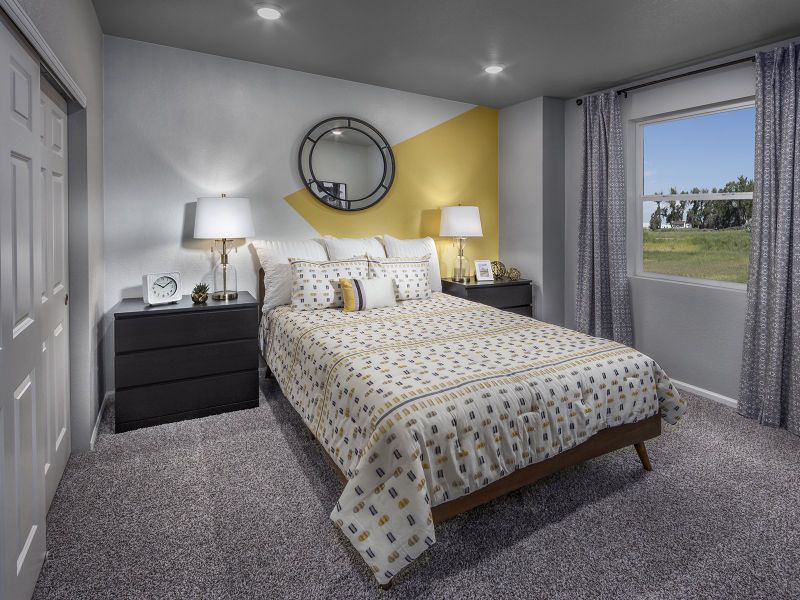 Furnished interior in a model home at Buffalo Highlands: The Canyon Collection in Commerce City (Image 12).